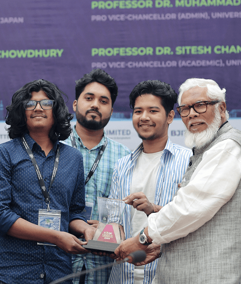 Jahangir collaborating with PJ at a hackathon